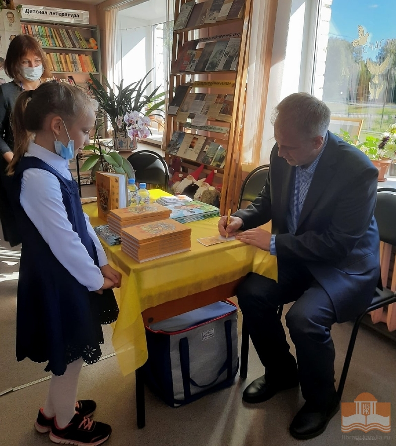 На встрече с писателем Илья Полуницыным. Автограф на память